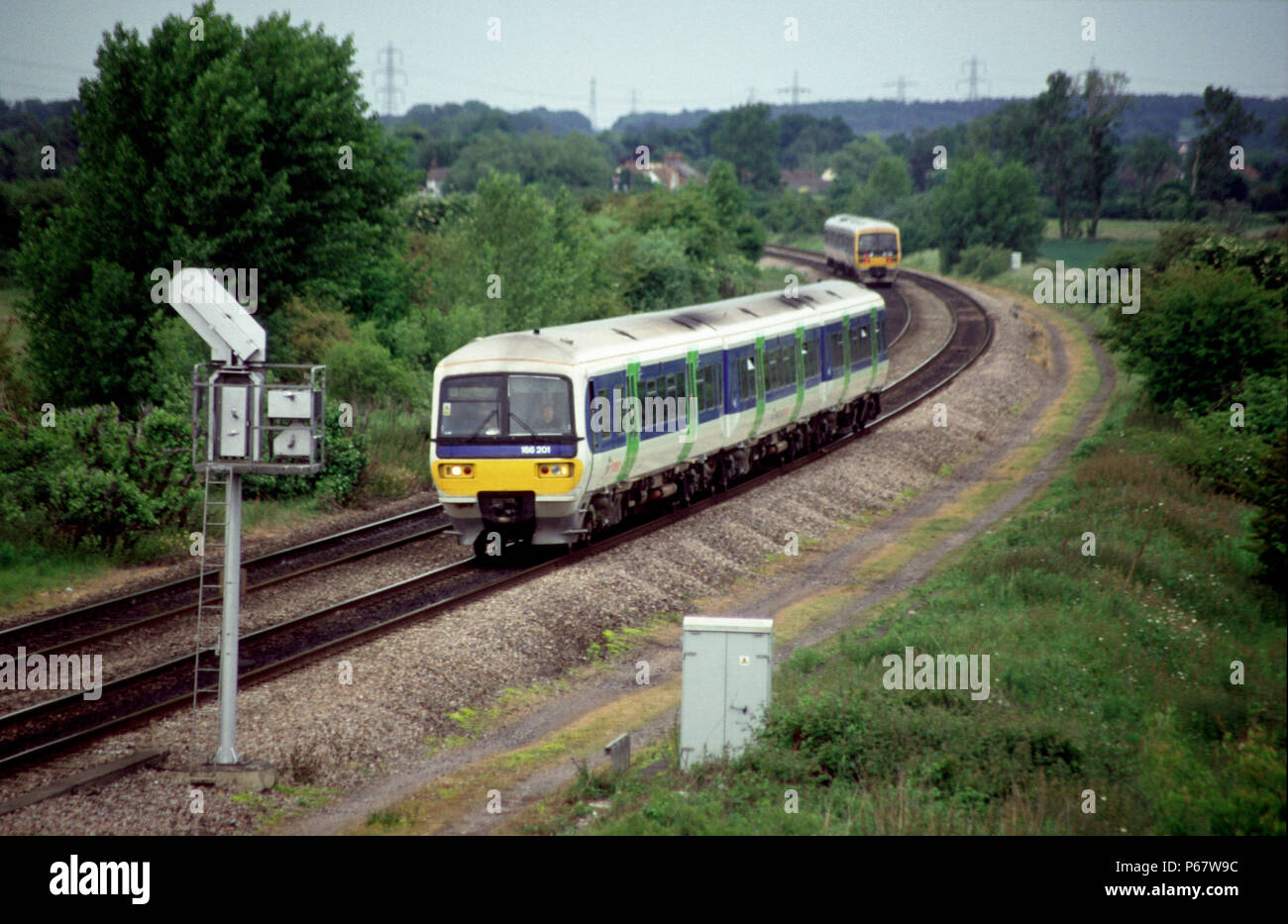 The fleet of Network Turbo Class 165 / 166 DMU trainsets were introduced by Network South East for its suburban services out of Paddington and were su Stock Photo