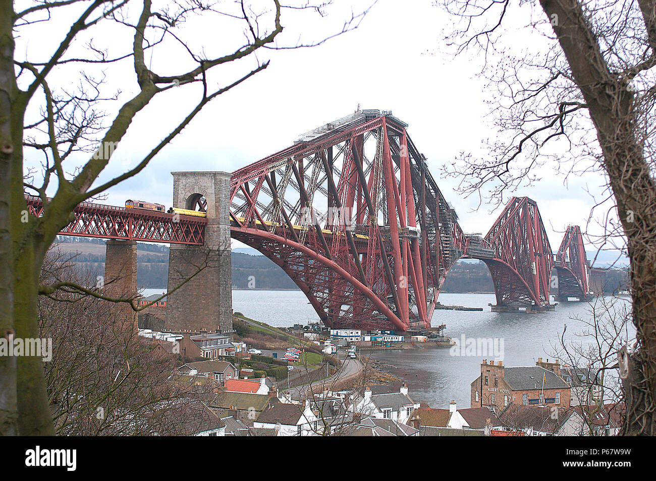 The Forth Bridge sees a little regular freight traffic including the movement of steel pipes from Hartlepool to Inverness seen approaching North Queen Stock Photo