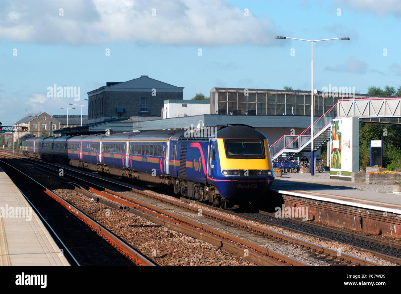 The Great Western Railway. Swindon Station. View from east end of Down platform looking west as an Up express calls at the platform. October 2004. Stock Photo