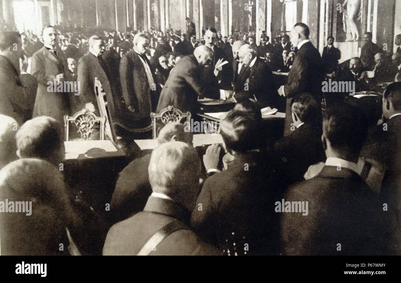 Treaty of Versailles is signed by Prime minister Clemenceau signs for France at the peace conference June 1919 Stock Photo