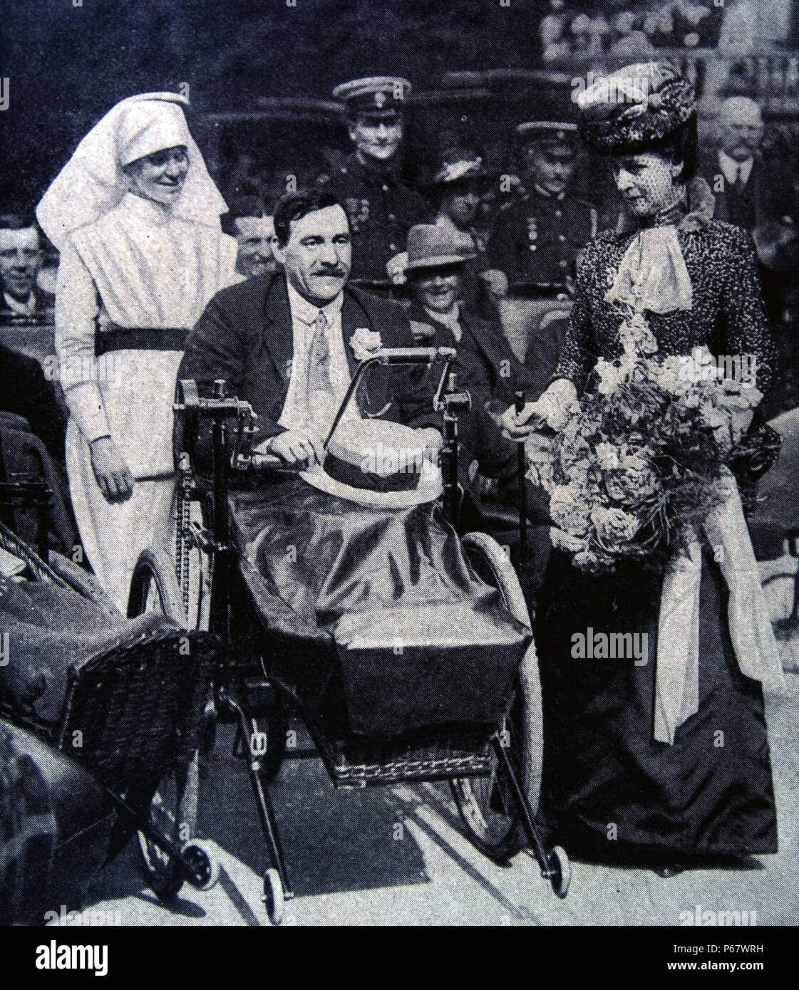 Queen Alexandra of Great Britain visits wounded ex-servicemen from world war one in 1919 Stock Photo