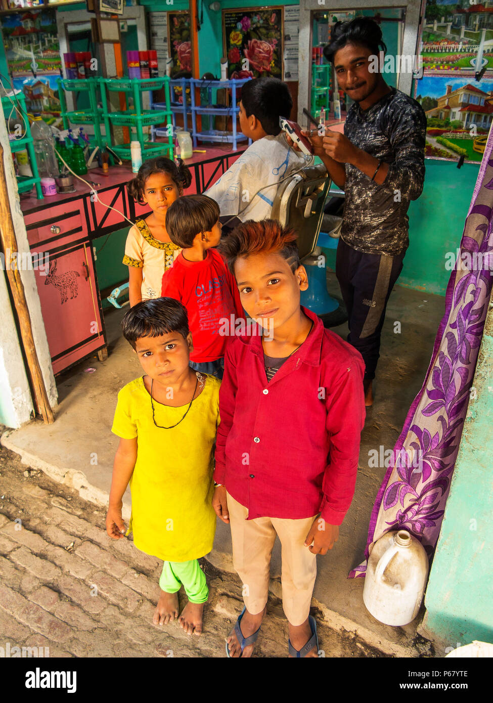 Indian kids at an Hair Cut Shop at Pawalgarh, India Stock Photo - Alamy