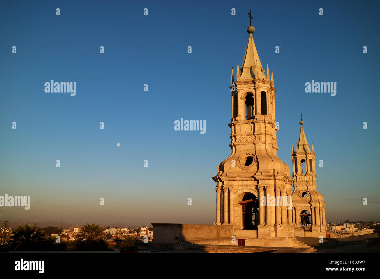 Impressive bell tower of Basilica Cathedral of Arequipa with the morning moon, Arequipa, Peru Stock Photo