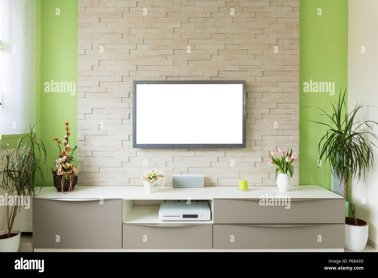 Modern living room interior tv mounted on brick wall with white