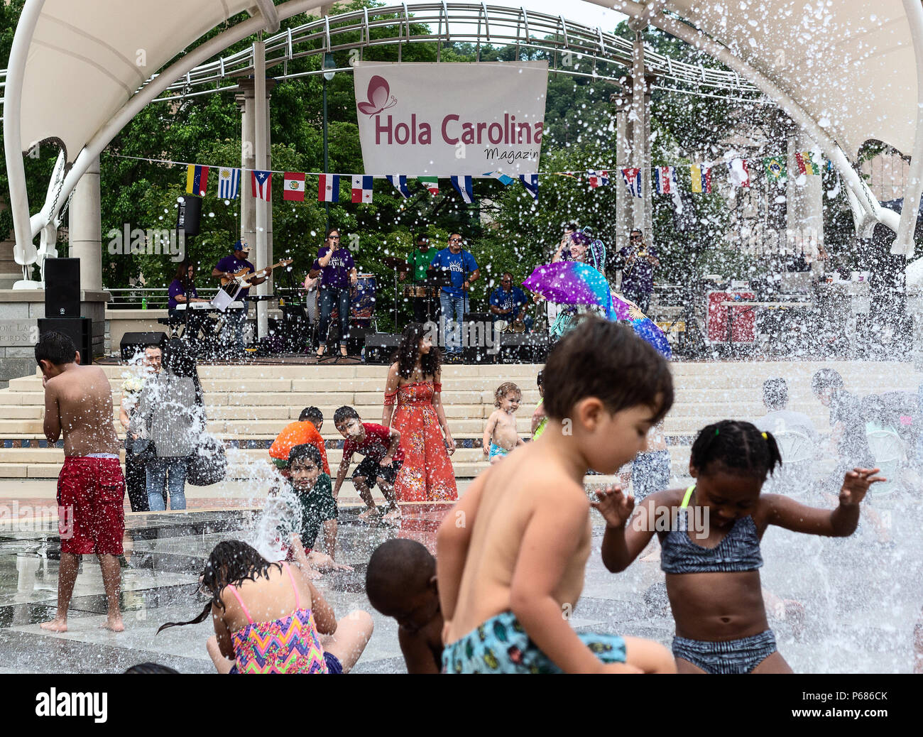 Children play in the water at "Splashville" in Asheville, NC, USA Stock
