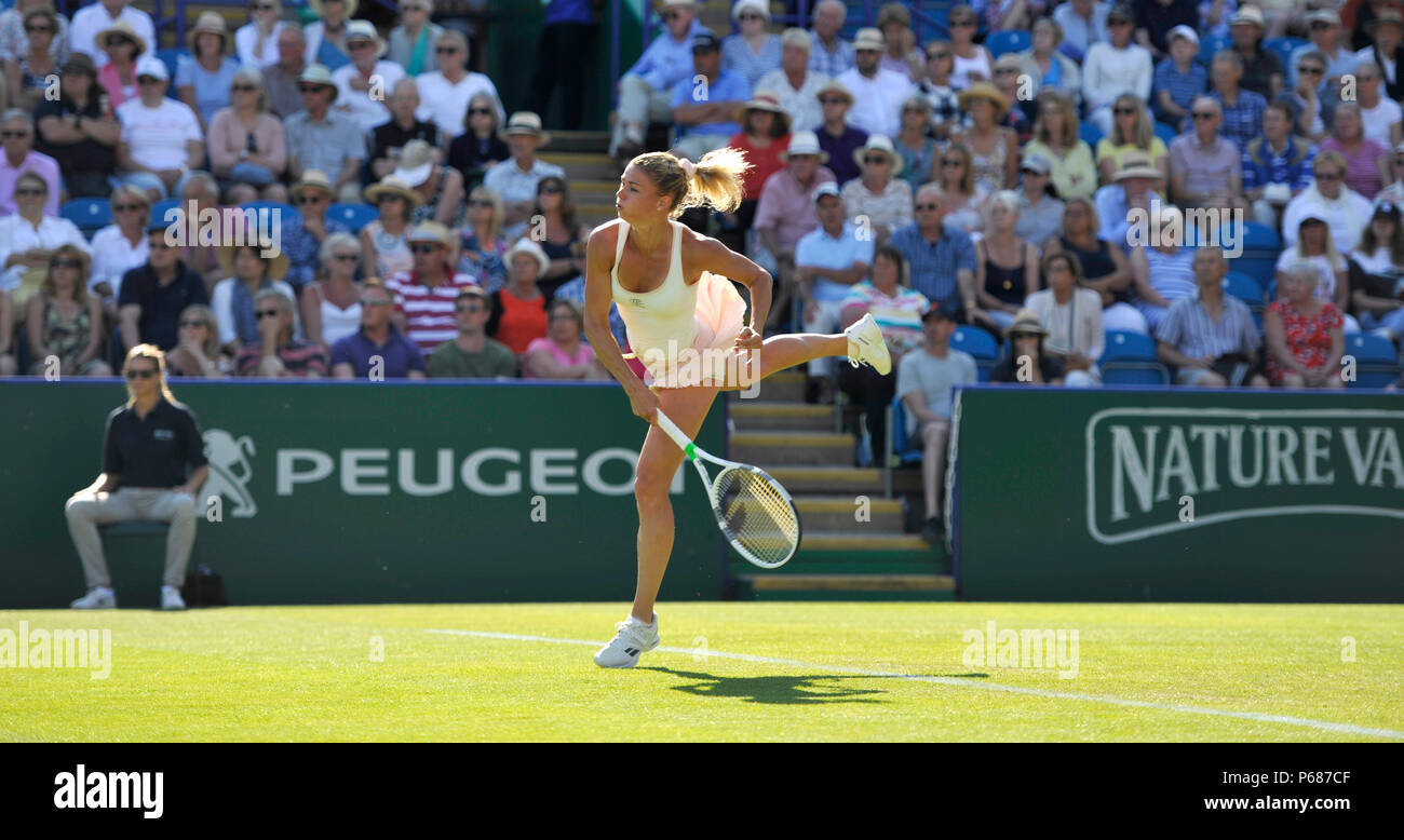 Camila Giorgi of Italy in action against Caroline Wozniacki of Denmark  during the Nature Valley International tennis tournament at Devonshire Park in Eastbourne East Sussex UK. 25 June 2018 Stock Photo