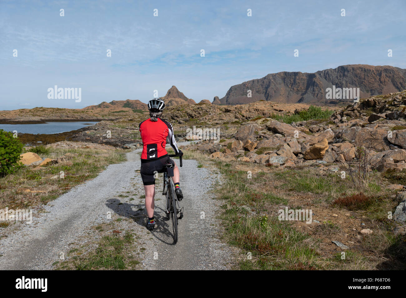 Cycling on Leka Island, Norway. Stock Photo