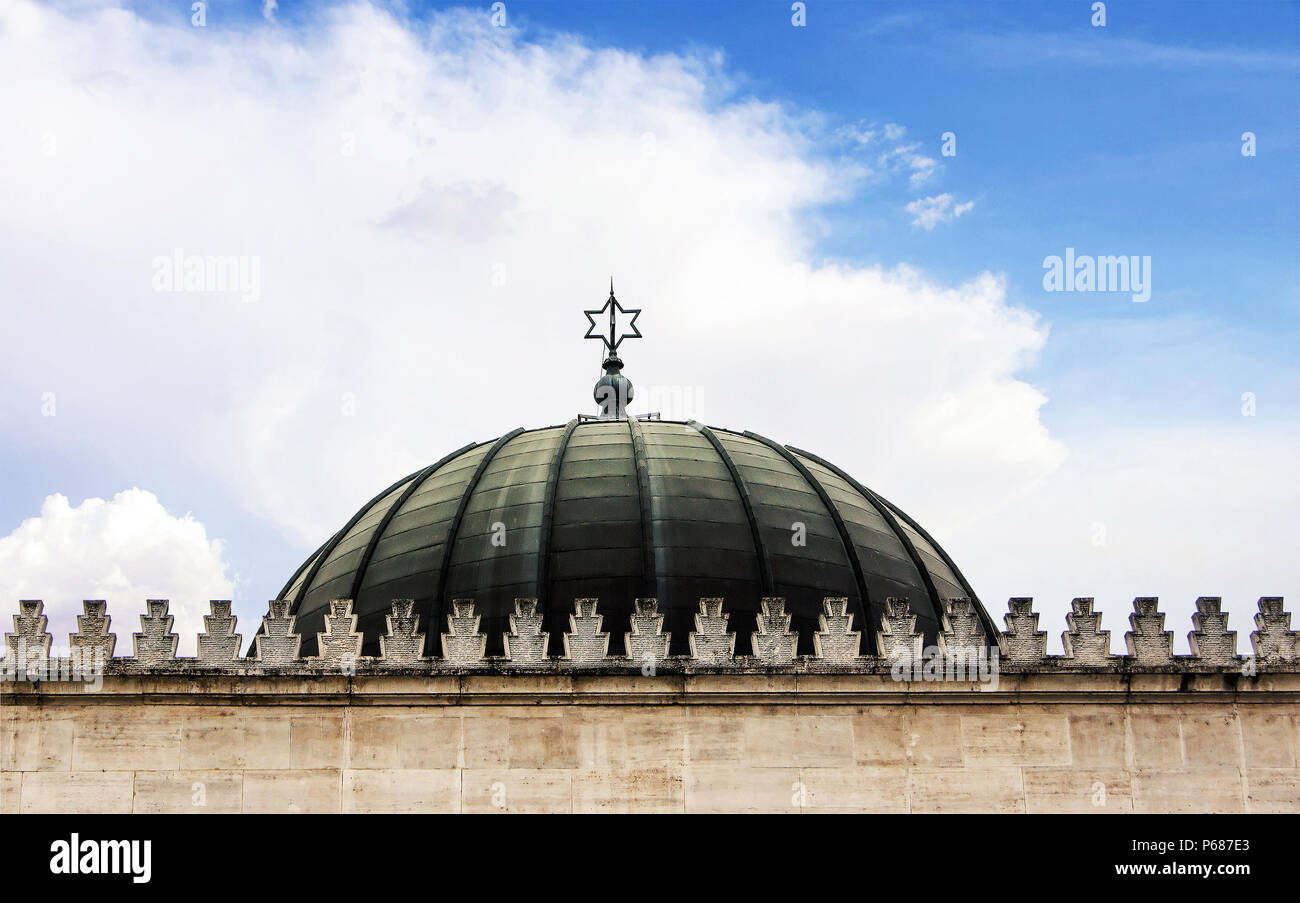 Dome of the synagogue with the sign of the star of David by day Stock Photo