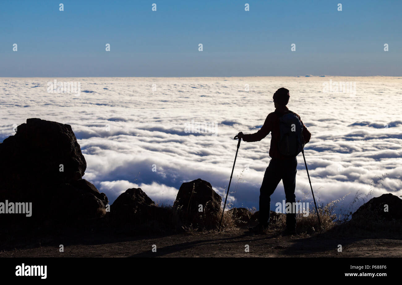 Cloud inversion man walking hi-res stock photography and images - Alamy