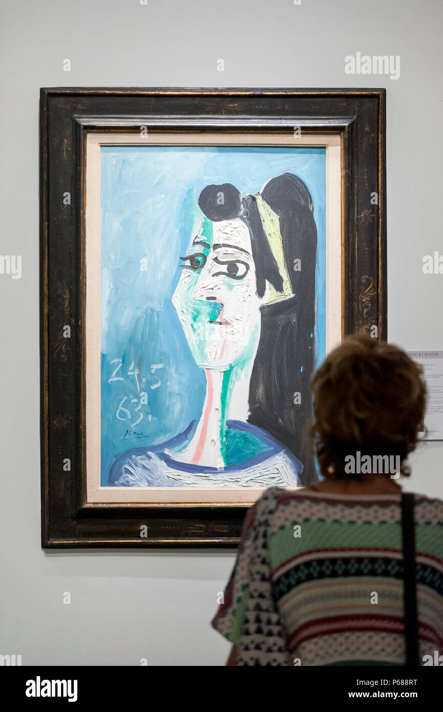London, UK.  28 June 2018.  A visitor views 'Tête De Femme', 1963, by Pablo Picasso. Members of the public visit Masterpiece London, the world's leading cross-collecting art fair held in the grounds of the Royal Hospital Chelsea.  The fair brings together 160 international exhibitors presenting works from antiquity to the present day and runs 28 June to 4 July 2018.  Credit: Stephen Chung / Alamy Live News Stock Photo