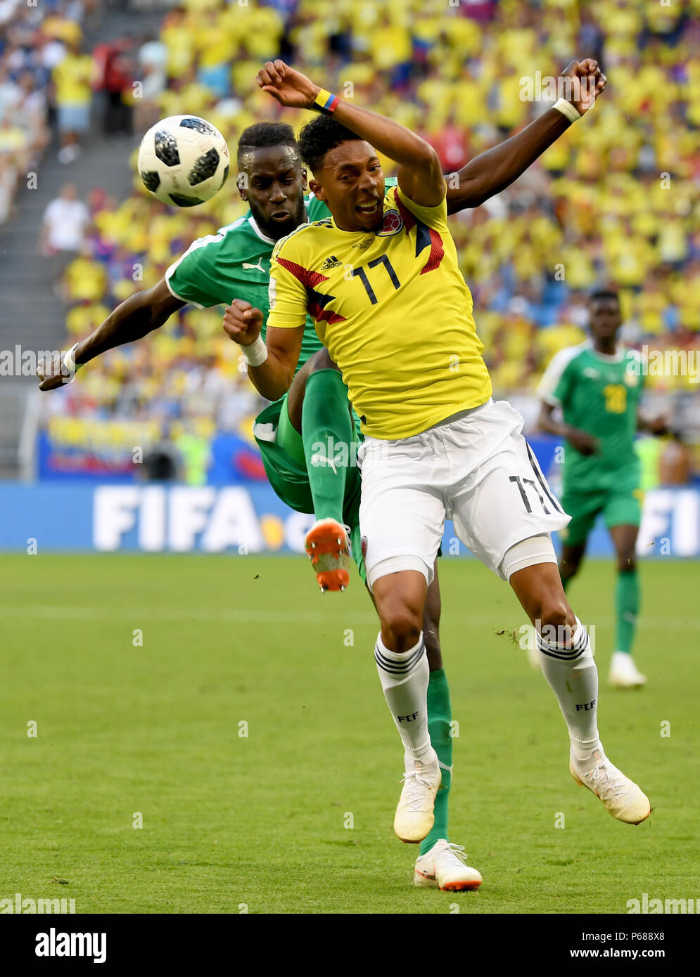 Samara, Russia. 28th June, 2018. Johan Mojica (R) of Colombia competes during the 2018 FIFA World Cup Group H match between Colombia and Senegal in Samara, Russia, June 28, 2018. Credit: Chen Cheng/Xinhua/Alamy Live News Stock Photo