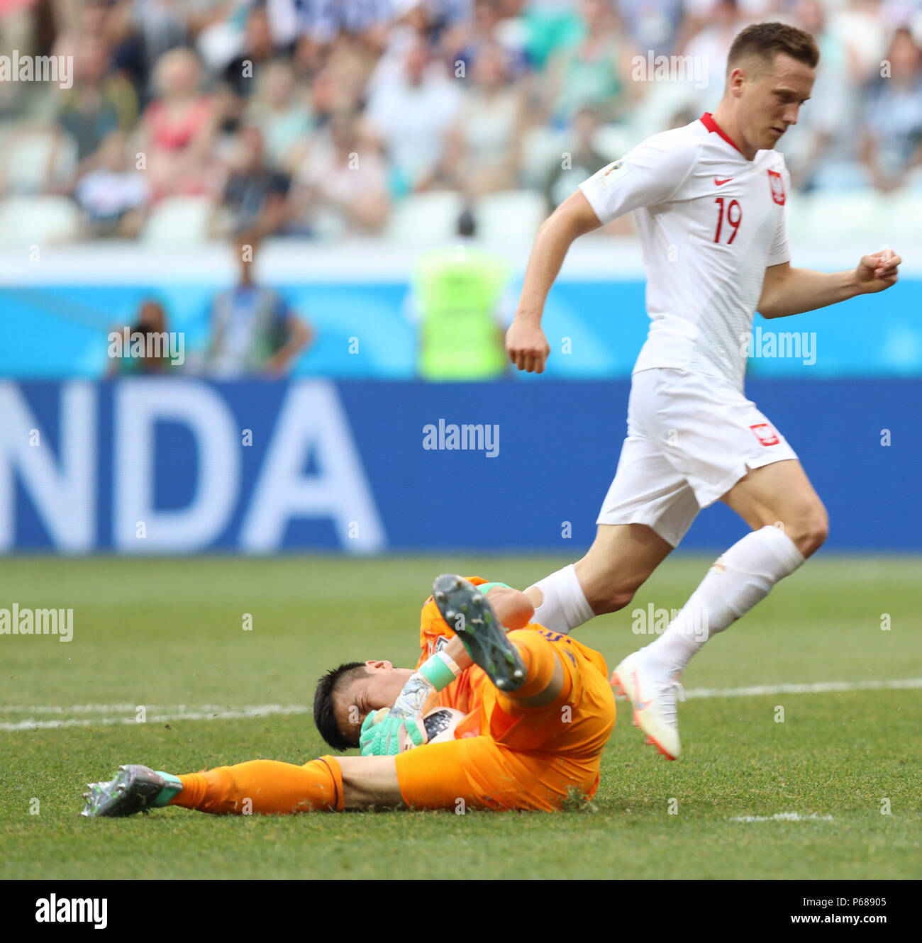 Volgograd, Russia. 28th June, 2018. Japan's goalkeeper Eiji Kawashima (bottom) defends during the 2018 FIFA World Cup Group H match between Japan and Poland in Volgograd, Russia, June 28, 2018. Credit: Yang Lei/Xinhua/Alamy Live News Stock Photo