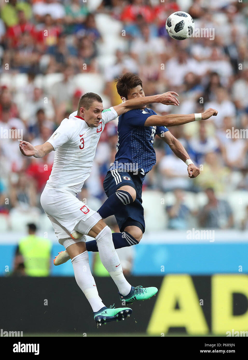 Volgograd, Russia. 28th June, 2018. Hiroki Sakai (R) of Japan vies with Artur Jedrzejczyk of Poland during the 2018 FIFA World Cup Group H match between Japan and Poland in Volgograd, Russia, June 28, 2018. Credit: Wu Zhuang/Xinhua/Alamy Live News Stock Photo