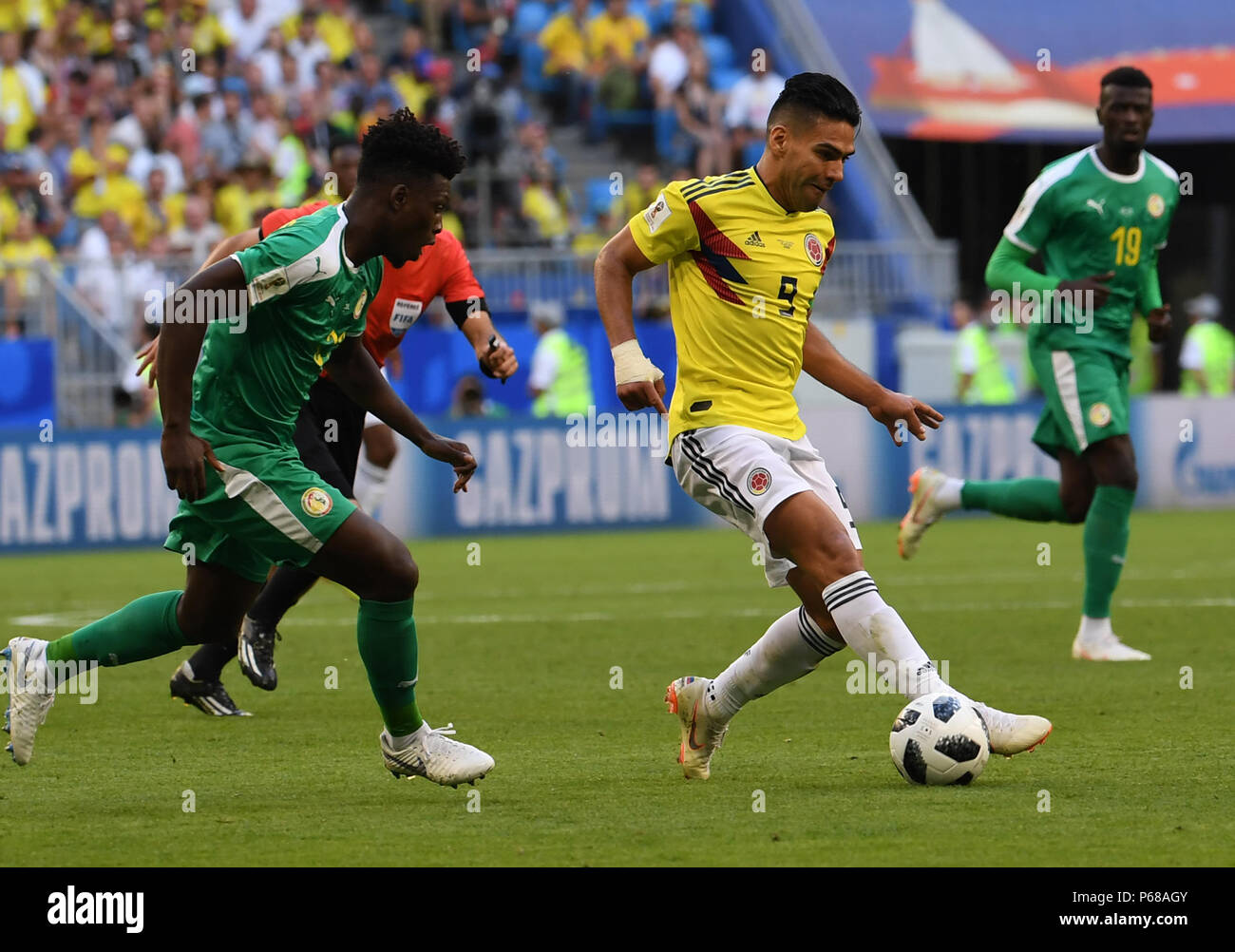 Samara, Russia. 28th June, 2018. Radamel Falcao (2nd R) of Colombia breaks through with the ball during the 2018 FIFA World Cup Group H match between Colombia and Senegal in Samara, Russia, June 28, 2018. Colombia won 1-0 and advanced to the round of 16. Credit: Chen Cheng/Xinhua/Alamy Live News Stock Photo