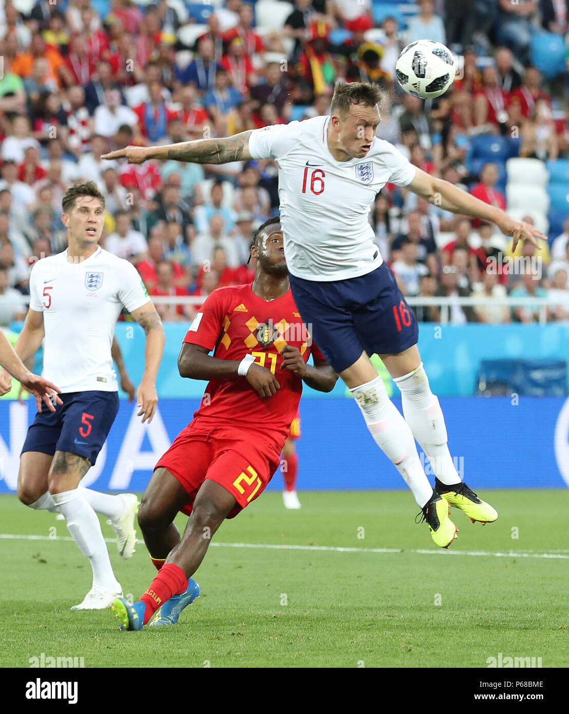 Kaliningrad, Russia. 28th June, 2018. Phil Jones (top) of England competes for a header during the 2018 FIFA World Cup Group G match between England and Belgium in Kaliningrad, Russia, June 28, 2018. Credit: Cao Can/Xinhua/Alamy Live News Stock Photo