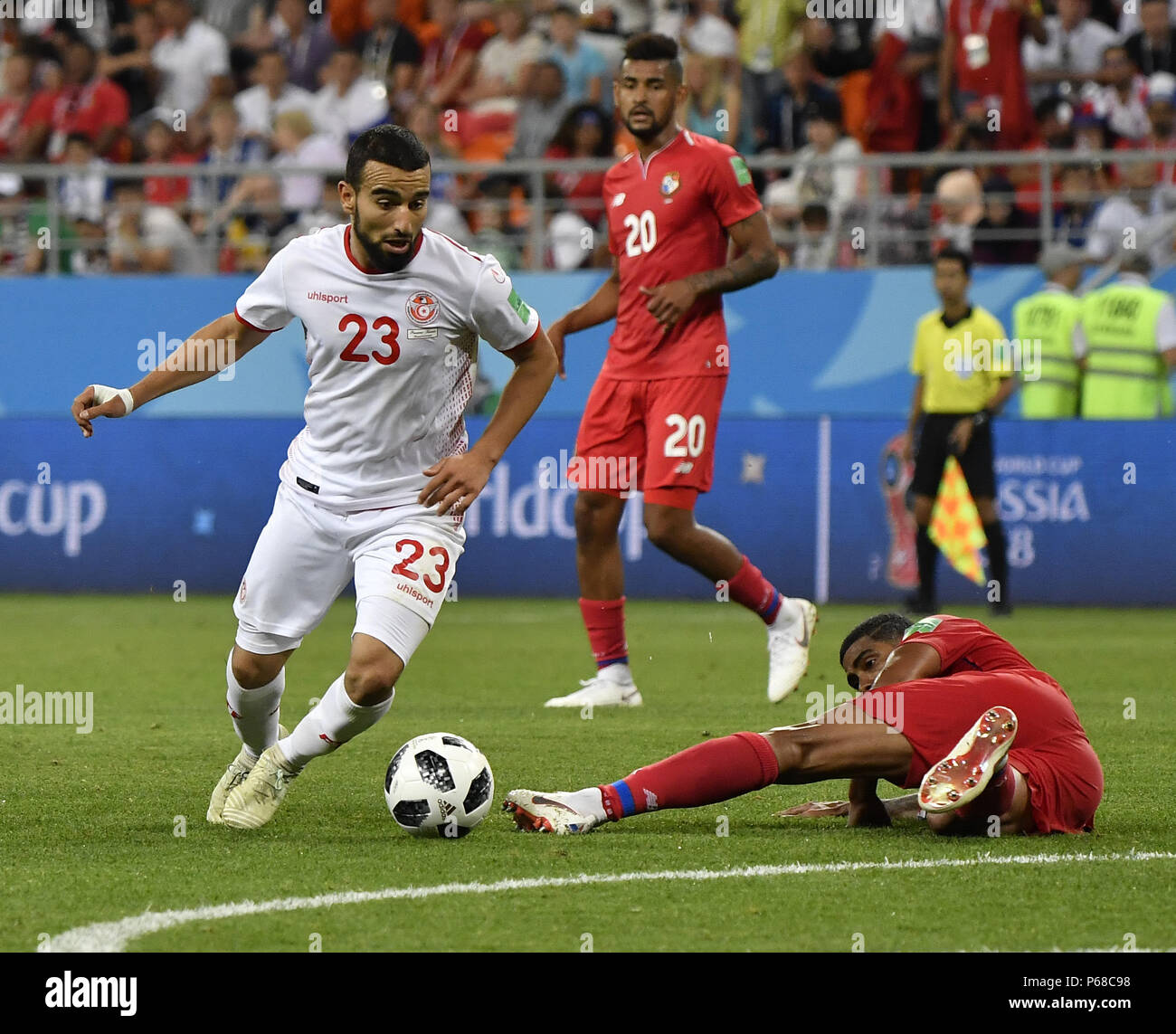 Saransk, Russia. 28th June, 2018. Naim Sliti (L) of Tunisia breaks through with the ball during the 2018 FIFA World Cup Group G match between Panama and Tunisia in Saransk, Russia, June 28, 2018. Credit: He Canling/Xinhua/Alamy Live News Stock Photo