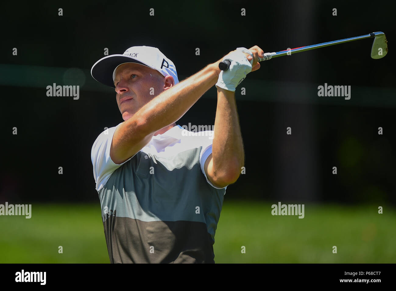 Potomac MD, USA. 28th June, 2018. Ben Crane (USA) tees off at the par three ninth hole during the opening round at the 2018 Quicken Loans National at the Tournament Players Club in Potomac MD. Credit: Cal Sport Media/Alamy Live News Stock Photo