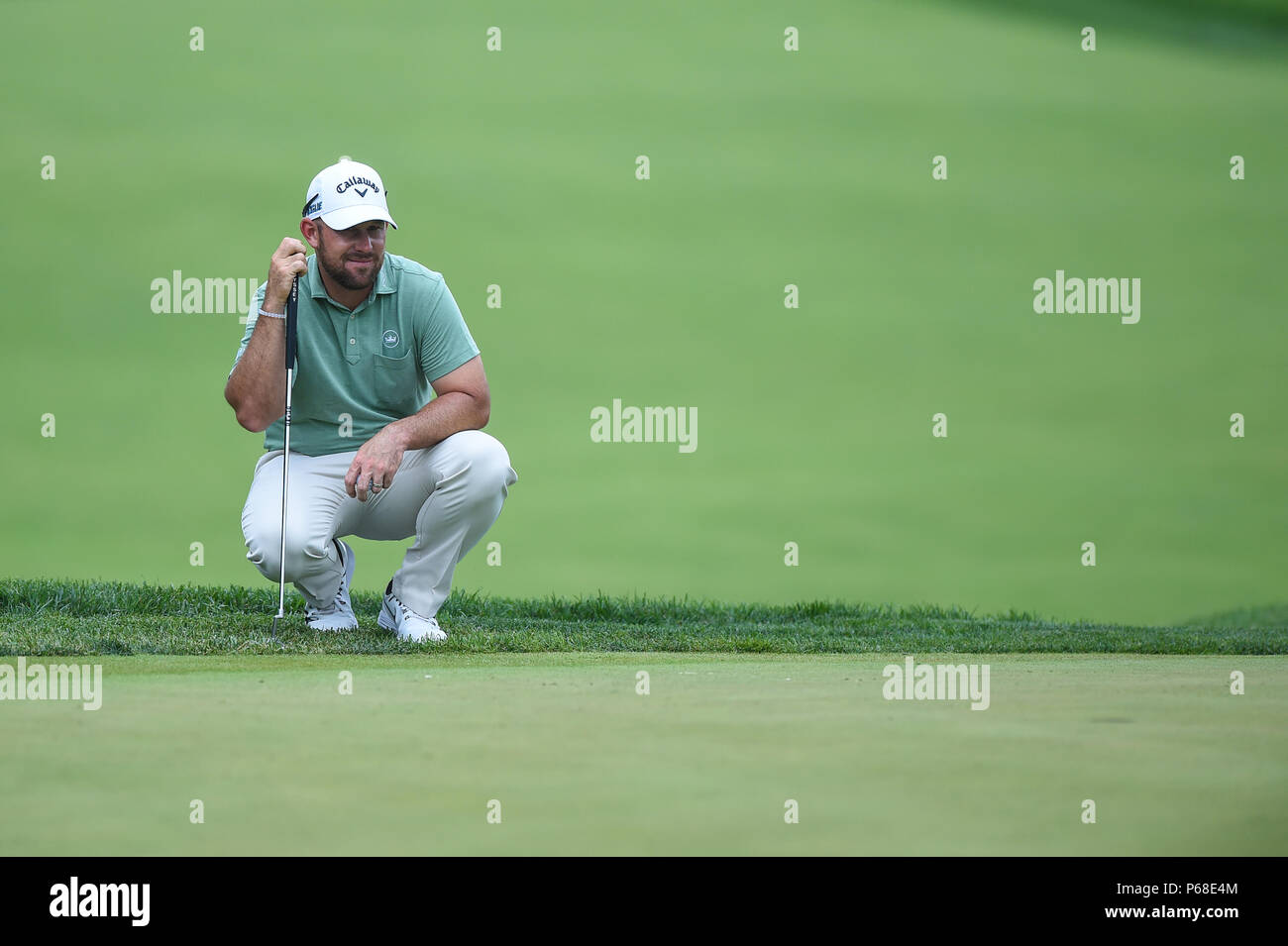 Potomac MD, USA. 28th June, 2018. Scott Brown (USA) eyes up his putt on the seventh hole during the opening round at the 2018 Quicken Loans National at the Tournament Players Club in Potomac MD. Credit: Cal Sport Media/Alamy Live News Stock Photo