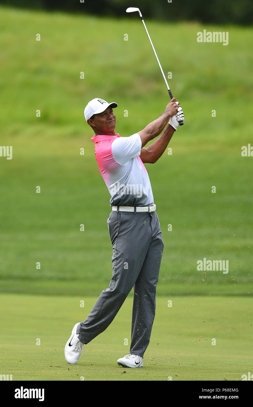 Potomac MD, USA. 28th June, 2018. Tiger Woods (USA) hits his approach shot from the center of the fairway at the second hole during the opening round at the 2018 Quicken Loans National at the Tournament Players Club in Potomac MD. Credit: Cal Sport Media/Alamy Live News Stock Photo