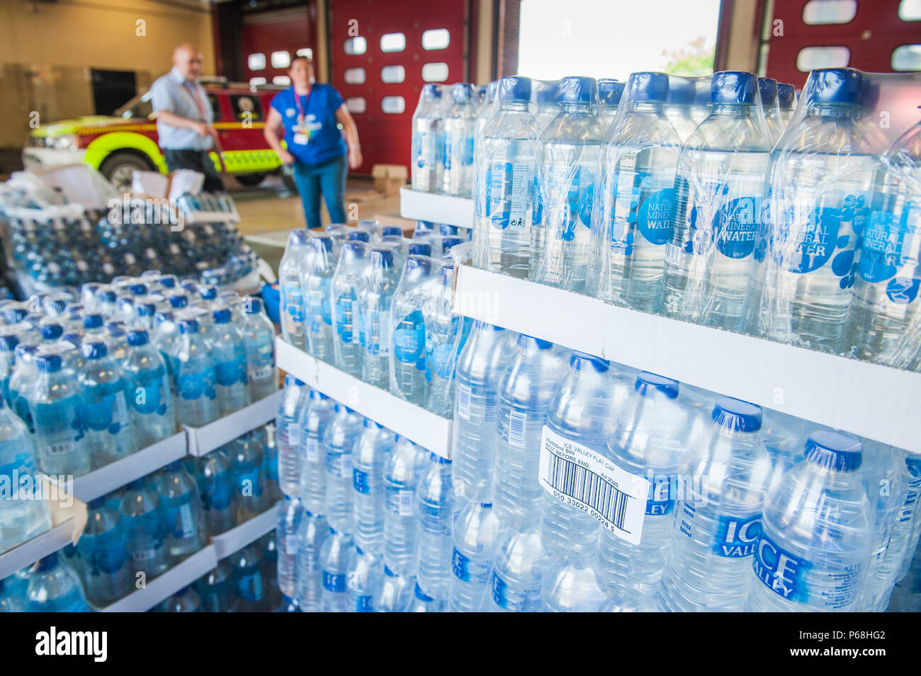 Stalybridge Fire Station, Greater Manchester, UK. 29th June, 2018. Supplies including water and food given by the public and local businesses for the needs of firefighters tackling the huge blaze on Saddleworth Moor, at Stalybridge Fire Station, Greater Manchester on Friday 29th June 2018. Credit: Matthew Wilkinson/Alamy Live News Stock Photo