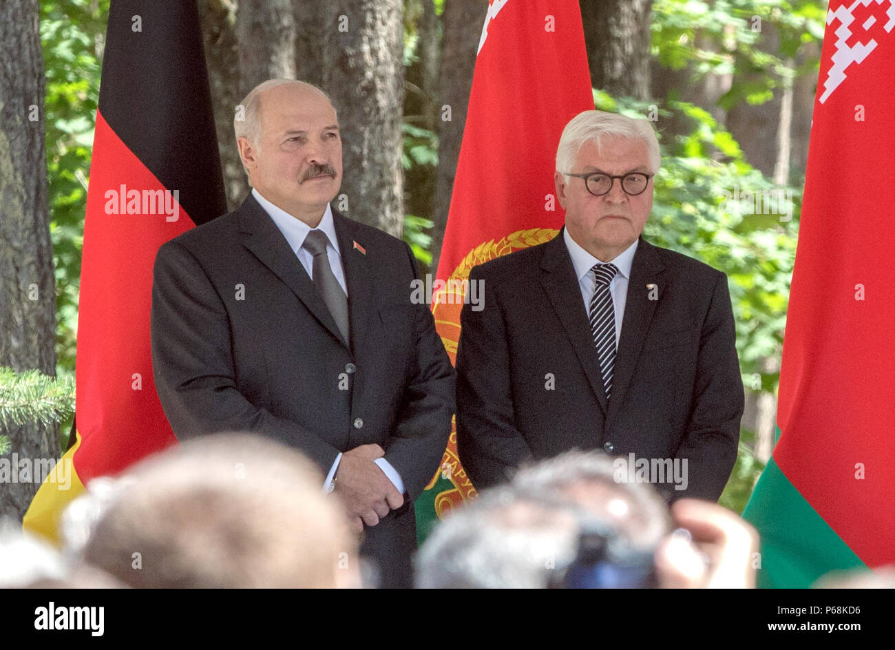 29 June 2018, Belarus, Minsk: German  President Frank-Walter Steinmeier (R, Social Democratic Party) and Alexander Lukashenko, Belarusian President, speak during the inauguration of the Malyj Trostenez Memorial. Malyj Trostenez was an Nazi extermination camp on former Soviet Union territory. Like many other extermination camps on Soviet territory, this camp is just known to few people in Germany and Europe. Photo: Jörg Carstensen/dpa Stock Photo