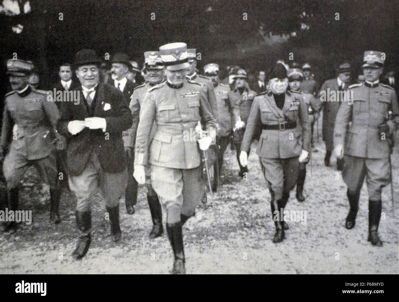 Rome - Mussolini, Minister of War, and the Joint Chiefs of Staff dell'Eservito, General Badoglio, and the Militia V. S. N. Bazan General, Ministry of Foreign Affairs to the polygon Stock Photo