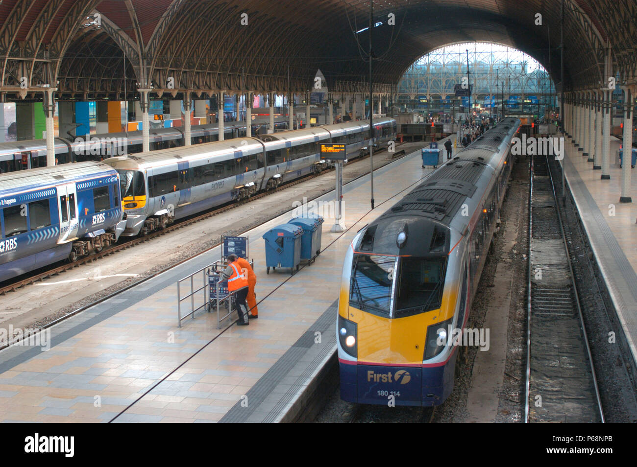 The Great Western Railway. Paddington station. View under trainshed with [ left ] Heathrow Express and [ right ] Great Western services awaiting depar Stock Photo