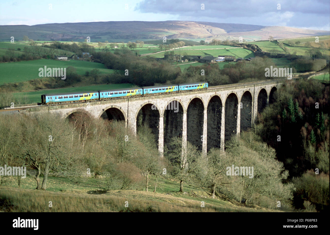 The Settle to Carlisle line at  Smardale viaduct with an Arriva Trains Northern service. 2004 Stock Photo