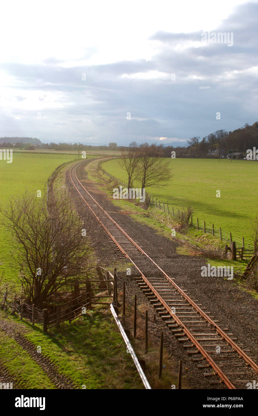 The Stirling to Alloa disused branch line in Scotland. View from road bridge looking to Stirling