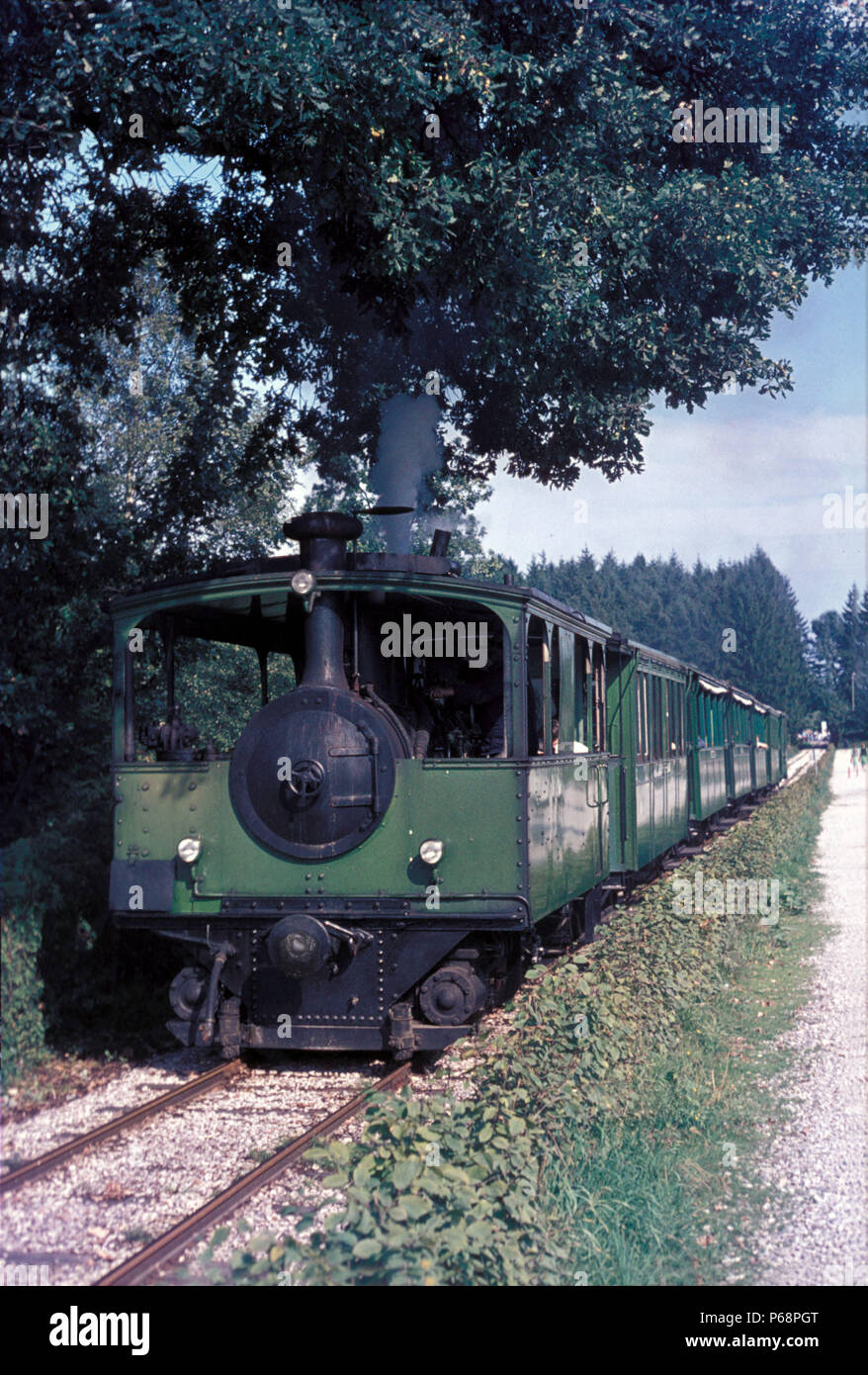 This delightful Steam Tram operates at Lake Chiemsee near Saltzburg on the German Austrian border. The Chiemseebahn runs from stock on the lakeside to Stock Photo