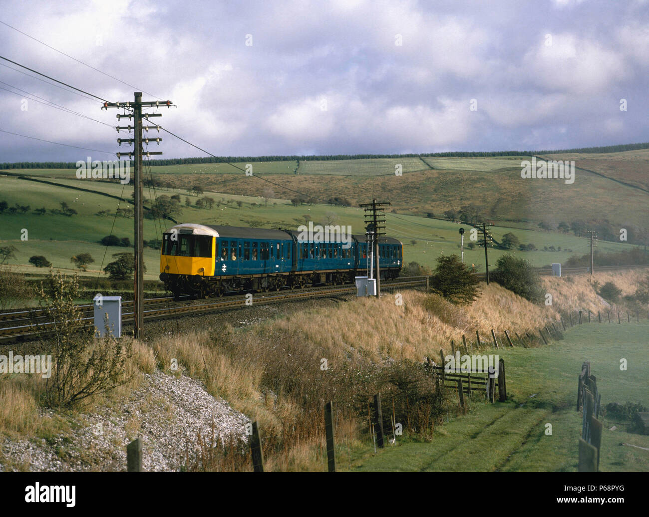 Vale of Edale. The 10.08 ex New Mills for Sheffield heads east for Hope. 9.11.85 Stock Photo