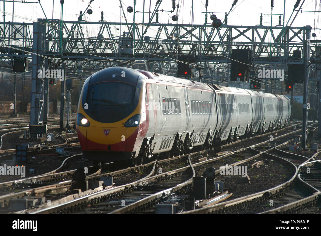 Virgin Trains Pendolino number 390.036 nears the end of its journey from Euston as it approaches Glasgow Central. November 2004. Stock Photo