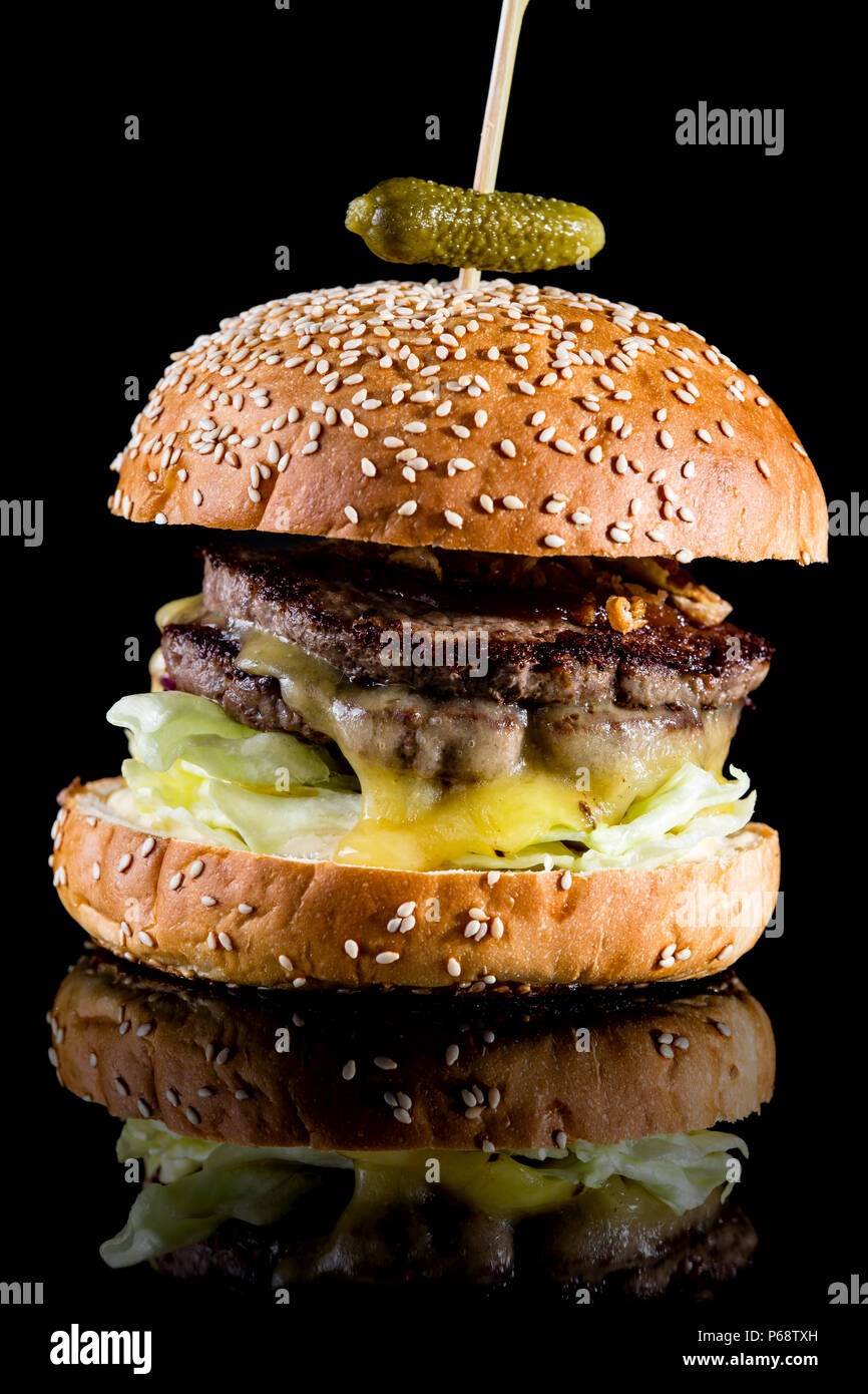 Mouthwatering burger topped with deep fried onions, matured Cheddar