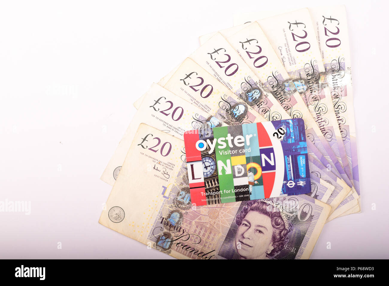 British 20 pounds paper currency note on white background Stock Photo ...