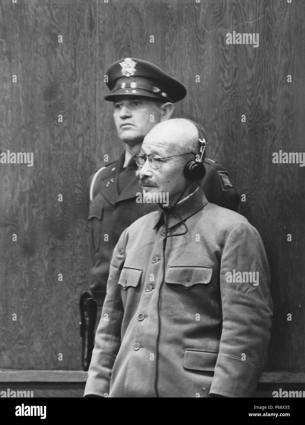 Photograph of Hideki Tojo receiving his death sentence (1884-1948) General of the Imperial Japanese Army, the leader of the Imperial Rule Assistance Association, and the 40th Prime Minister of Japan during most of World War II. Dated 1948 Stock Photo