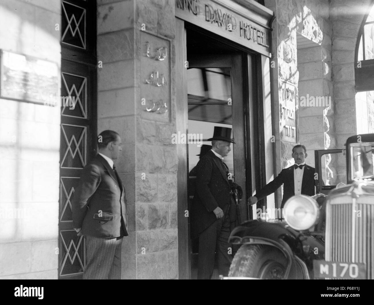 Photograph of Lord Earl Peel entering his car from the main entrance of King David Hotel, Jerusalem. Dated 1936 Stock Photo