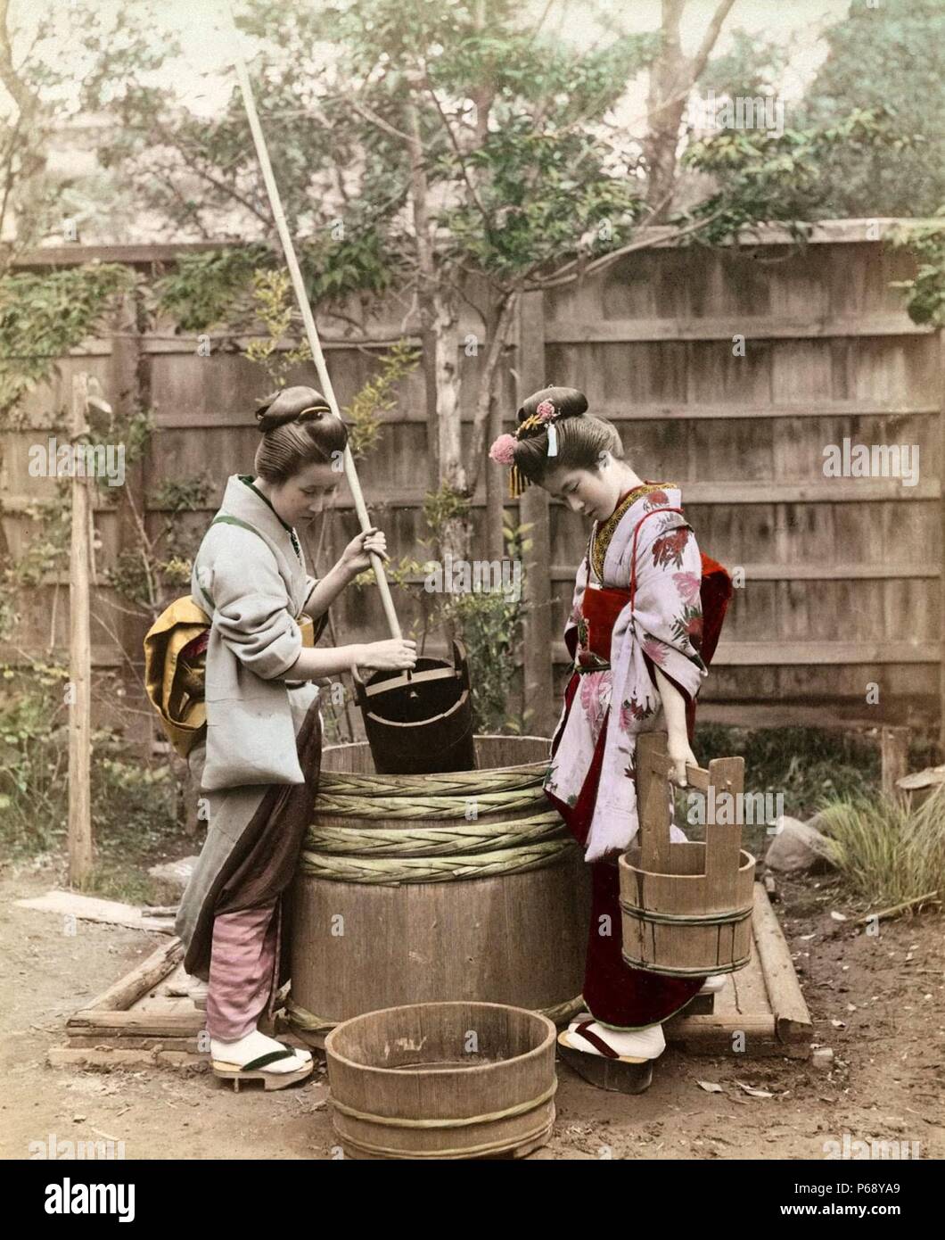 https://c8.alamy.com/comp/P68YA9/colour-photograph-of-japanese-women-drawing-water-from-a-well-japan-dated-1890-P68YA9.jpg