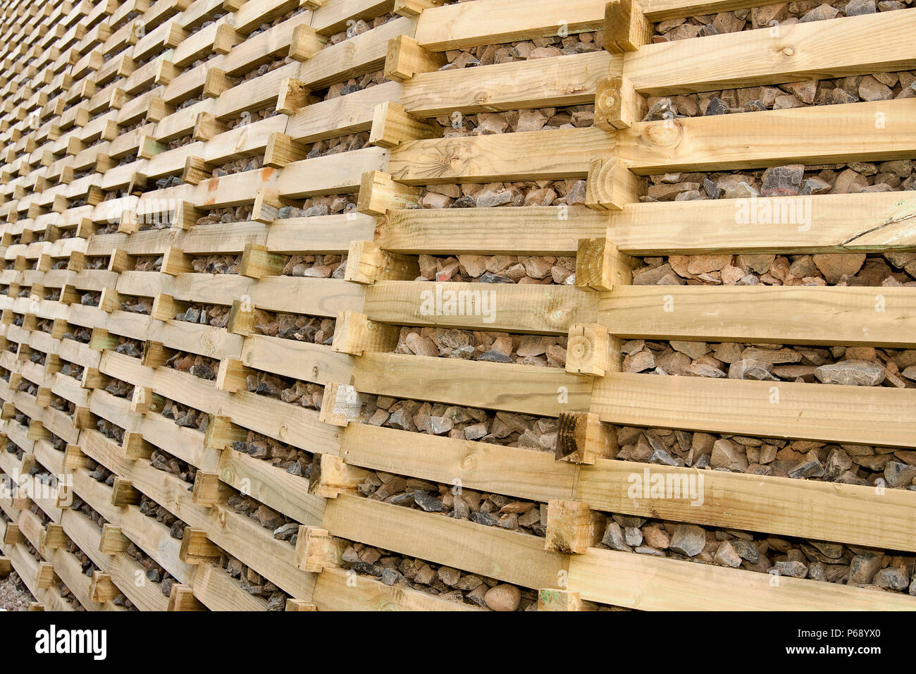 Timber crib retaining wall Stock Photo