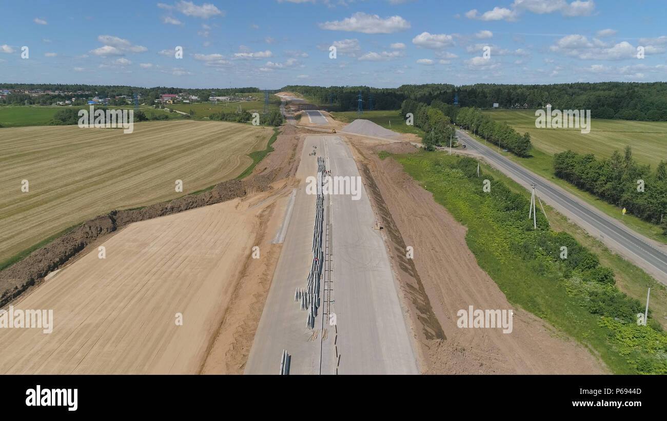 Construction of toll roads in rural areas. Aerial view construction of