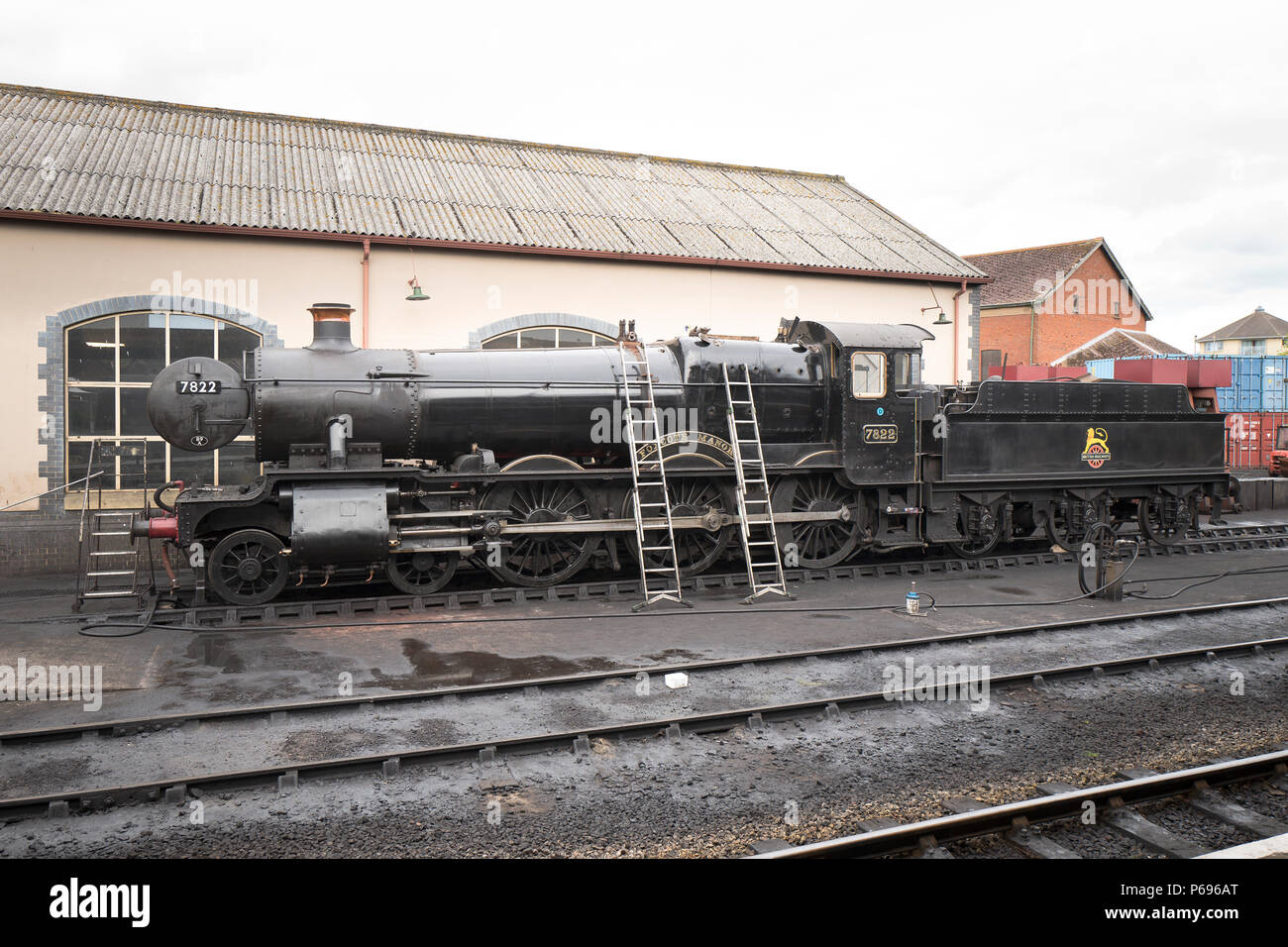 No 7822 Ex-GWR FOXCOTE MANOR undergoing maintenance at Minehead on the West Somerset Railway in the UK Stock Photo