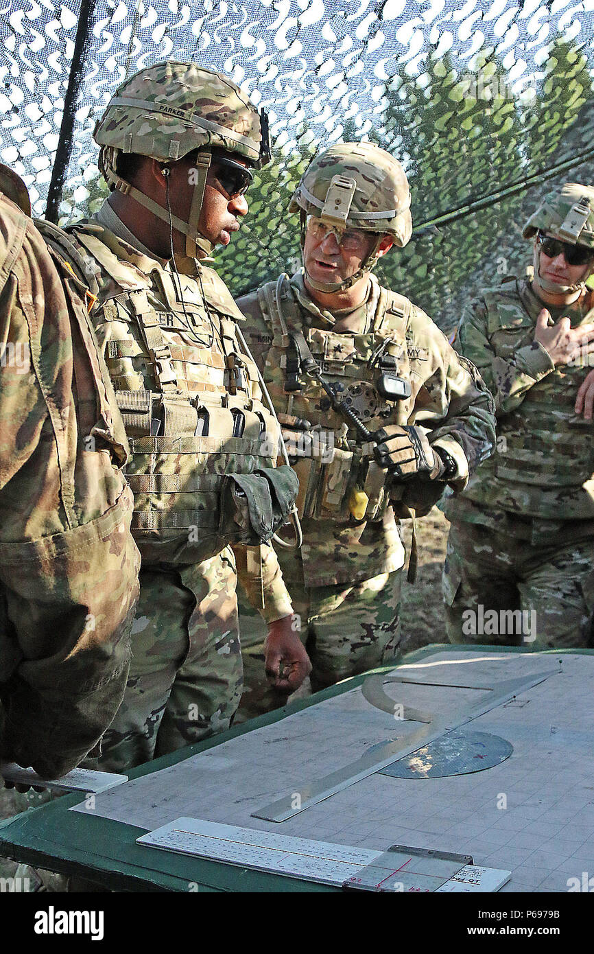 Brigadier General James Mingus (center), commander of the 4th Infantry