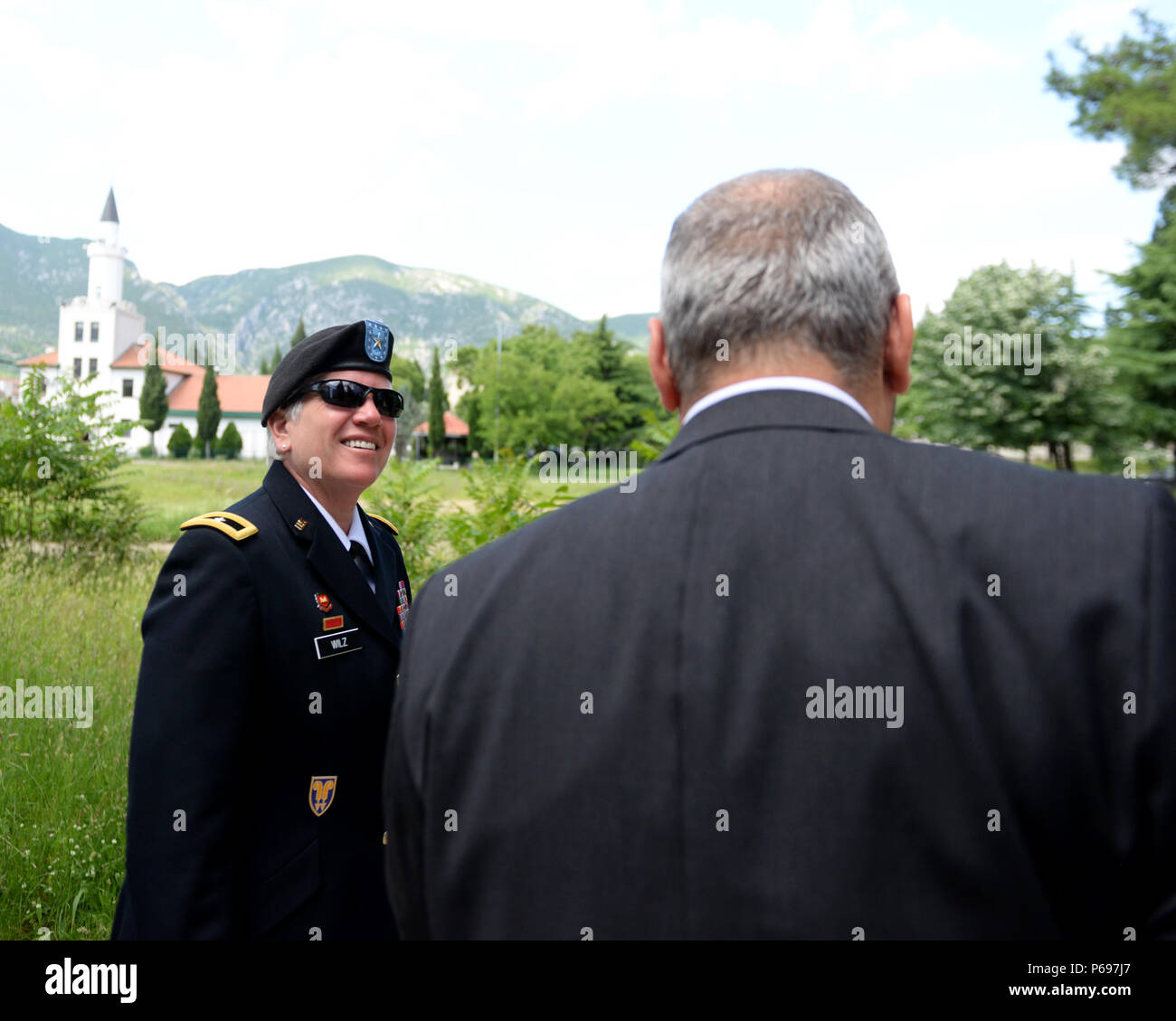Brig. Gen. Giselle Wilz, NATO Headquarters Sarajevo commander, Brig. Gen. Giselle Wilz, NATO Headquarters Sarajevo commander, talks with Professor Sead Pašić, Džemal Bijedić University rector, in Mostar, Bosnia and Herzegovina, May 23, 2016. The general and Edward Ferguson, the British Ambassador to BiH, gave a lecture to more than 100 students at the university on the political aspects of the Euro-Atlantic integration and the importance of NATO as well as successes of BiH armed forces in regards to defense reform. After their presentations, the key NATO leaders in BiH engaged in a lively dial Stock Photo