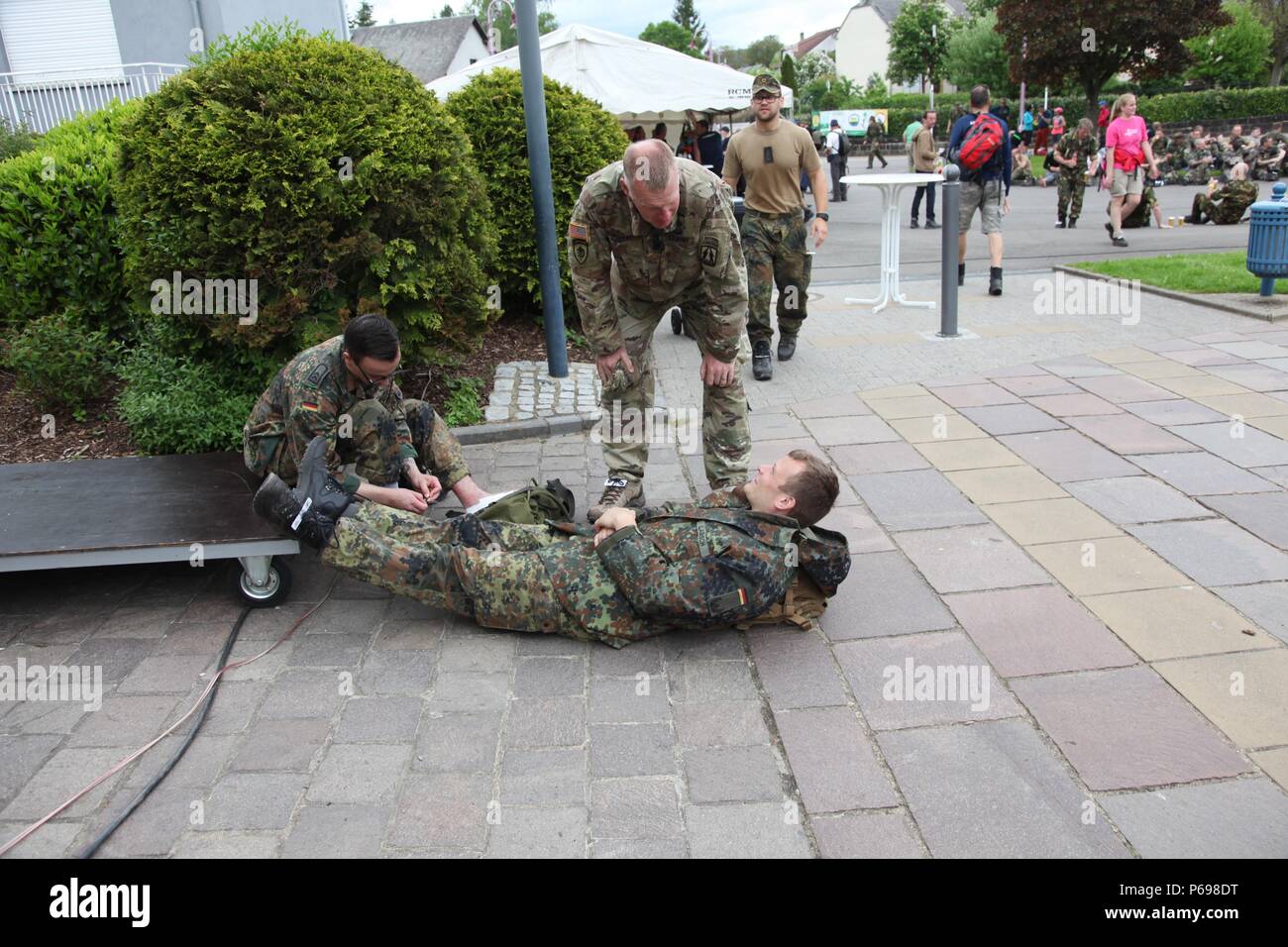 This is an annual international marching event hosted by the Luxembourg Army and the city of Diekirch. Civilians and Military participants complete 80 kilometers during a two day period around the vicinity of Diekirch, Luxembourg. (U.S. Army photo by Sgt. Sergio Villafane/Released) Stock Photo