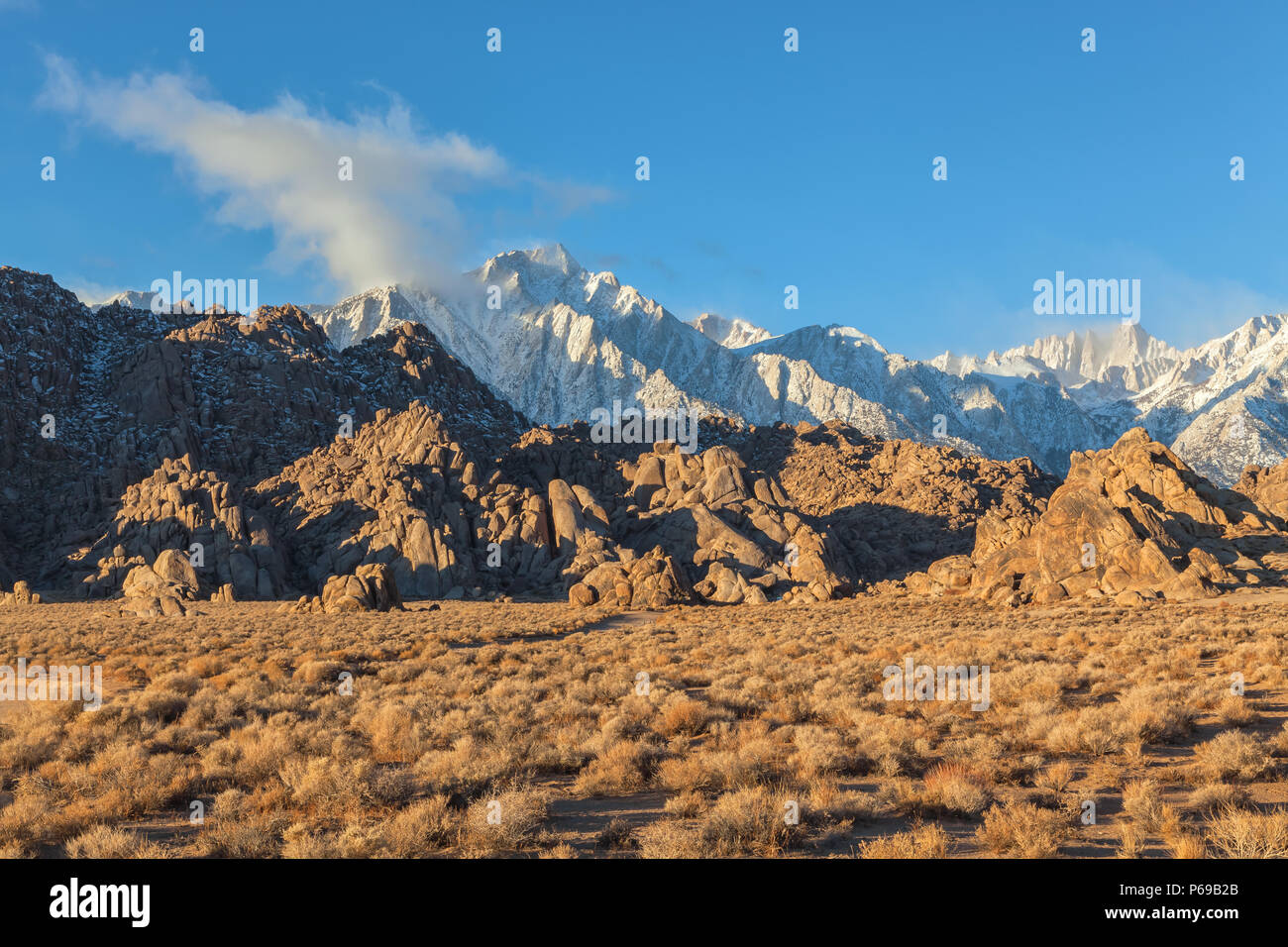 Morning at Alabama Hill, Lone Pine, California, USA, with the Lone Pine Peak, Mt. Whitney covered with snow in background. Stock Photo