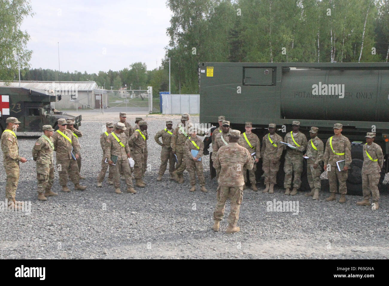 Soldiers from 3rd Brigade Support Battalion, 1st Armored Brigade Combat Team, 3rd Infantry Division, prepares their vehicles May 18 at Grafenwohr Training Area to convoy to Poland for Exercise Anakonda 16. Stock Photo