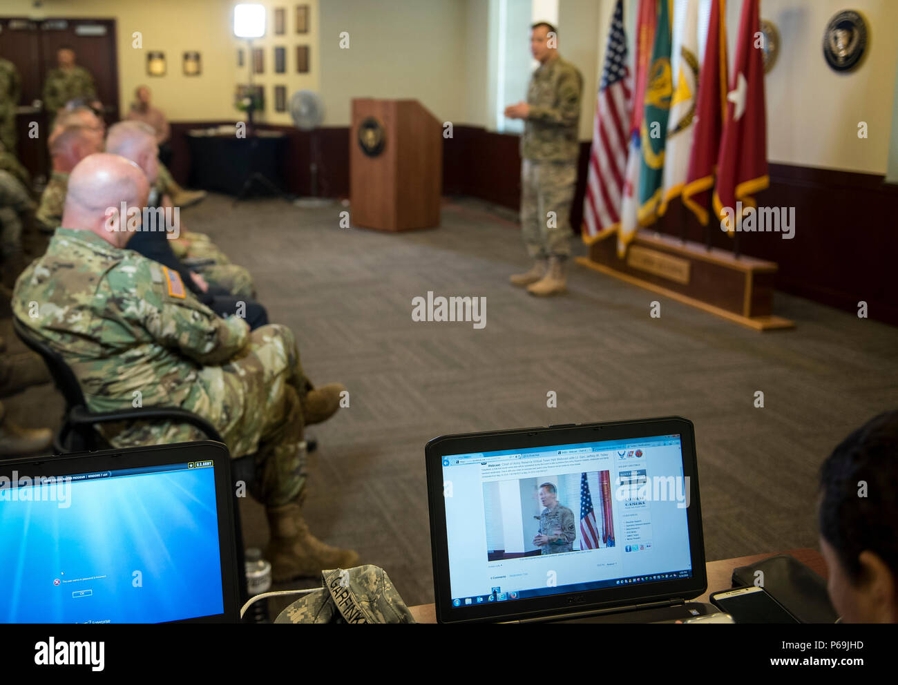 A laptop screen connected online feeds a live broadcast of Lt. Gen. Jeffrey Talley, chief of the U.S. Army Reserve, conducting his final town hall meeting at Fort Belvoir, Virginia, which was broadcasted live across the internet for viewers to participate from around the world, May 24. During the meeting, Talley spoke on a variety of topics affecting the Army Reserve and answered questions from both the online and live audiences. (U.S. Army photo by Master Sgt. Michel Sauret) Stock Photo