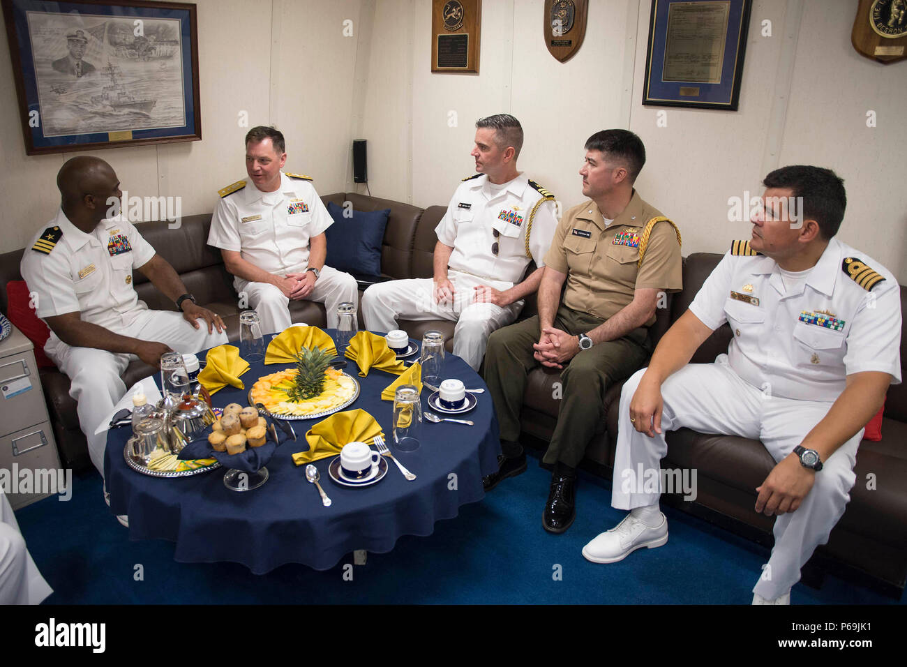 160519-N-MD297-077 CARTAGENA, Colombia (May 19, 2016) Rear Adm. George Ballance, commander, U.S. 4th Fleet, speaks to Cmdr. Robert Francis, commanding officer of the Arleigh Burke-class guided-missile destroyer USS Lassen (DDG 82), while visiting the ship in Cartagena, Colombia. Lassen is currently underway in support of Operation Martillo, a joint operation with the U.S. Coast Guard and partner nations within the 4th Fleet area of responsibility. Operation Martillo is being led by Joint Interagency Task Force South, in support of U.S. Southern Command. (U.S. Navy photo by Mass Communication S Stock Photo