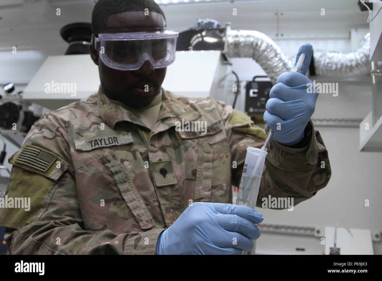 U.S. Army Spc. Terek E. Taylor, petroleum laboratory specialists with Alpha Company, 640th