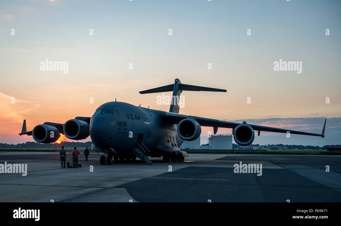 A U.S. Air Force C-17 Globemaster III rests on the flight line during ...