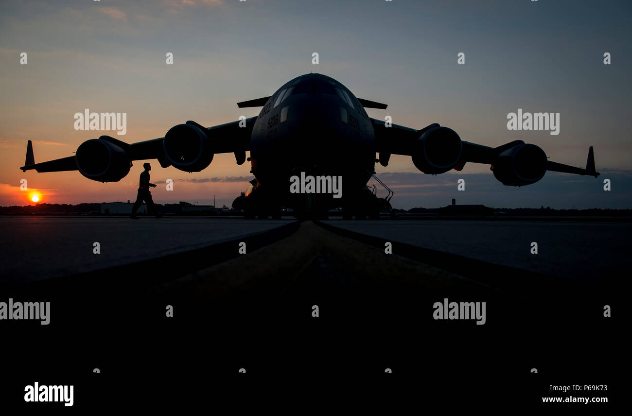 A U.S. Air Force C-17 Globemaster III rests on the flight line during ...